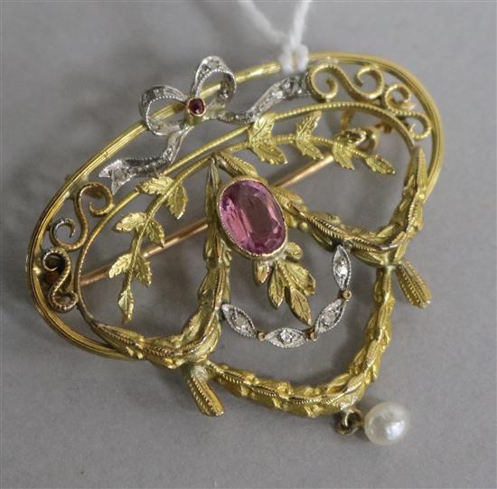 An early 20th century gold and gem set pierced openwork drop brooch, 36mm.